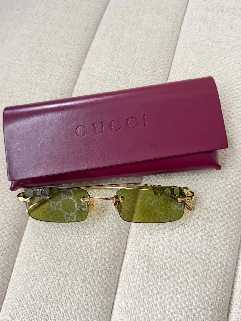 Gucci women’s Rimless Logo Sunglasses in Green